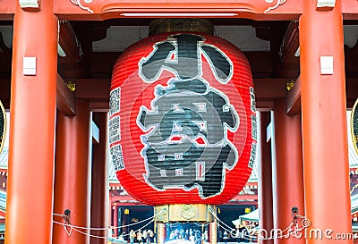 TOKYO, JAPAN - APRIL 7 Imposing Buddhist structure features a massive paper lantern painted in vivid red-and-black tones to sugge Editorial Stock Photo