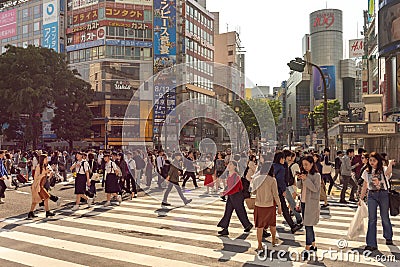 People crossing the famous Shibuya intersection in Tokyo, Japan Editorial Stock Photo