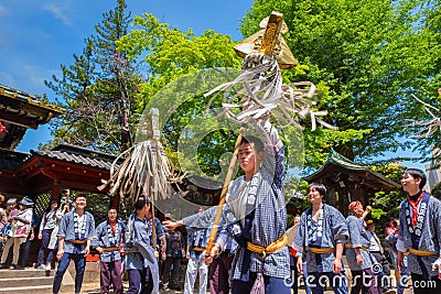 People parade through a street to Nezu-jinja shrine in Bunkyo Azalea Festival in Tokyo, japan Editorial Stock Photo