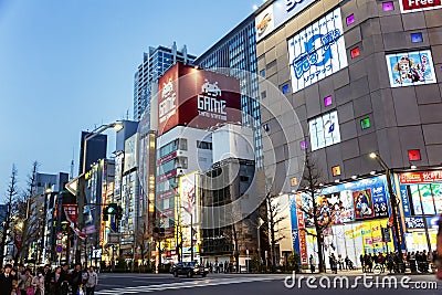 Tokyo, Japan, 04/04/2017: Asian night metropolis with beautiful buildings. Close-up Editorial Stock Photo