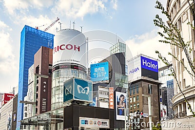 Tokyo, Japan, Ginza Metro Station Logo and Skyscrapers Editorial Stock Photo