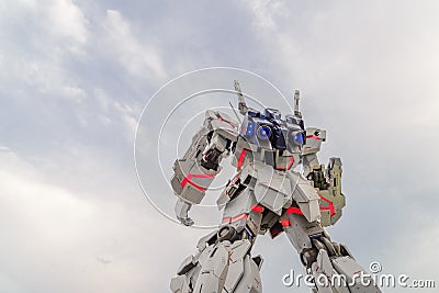 Tokyo, Japan - July 2018: Back view of Real-size of the Unicorn Gundam RX-0 standing in front of the Diver City Tokyo Plaza Editorial Stock Photo