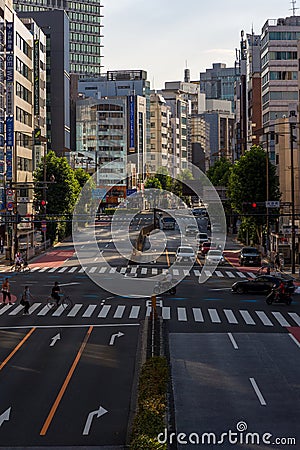 TOKYO, JAPAN - JULY 16 2023: Near deserted streets and roads in central Tokyo as the population shelters indoors from the hot, Editorial Stock Photo