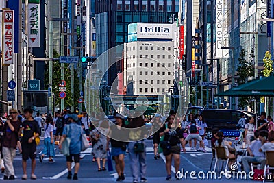 TOKYO, JAPAN - JULY 30 2023: Roads closed for pedestrians and shoppers in the high end shopping Ginza area of Tokyo Editorial Stock Photo