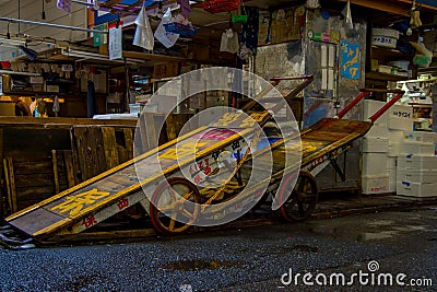 TOKYO, JAPAN JUNE 28 - 2017: Old rusted Flatbed Cart inside of a building of the Tsukiji Wholesale Seafood and Fish Editorial Stock Photo