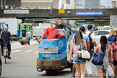 Tokyo, Japan - June 18, 2015 : worker are busy in The Tsukiji Market. In June 18, 2015 Editorial Stock Photo