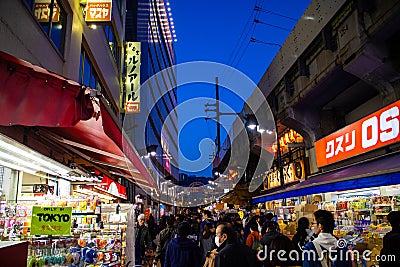 Tokyo / Japan- March 12, 2019: Walking street at Ueno Station. Food market and shopping street. Famous place in Ueno Editorial Stock Photo