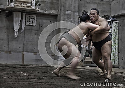 TOKYO, JAPAN - May 18, 2016: Japanese sumo wrestler training in their stall in Tokyo on May 18. 2016 Editorial Stock Photo