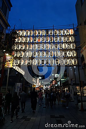 lighted asian paper lanterns at night in Tokyo Editorial Stock Photo