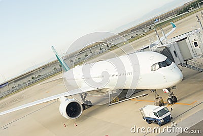 Kaisai, Japan -Oct 27, 2017: Airplane loading off its passengers Editorial Stock Photo