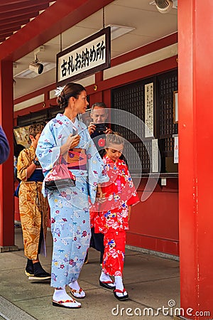 Unidentified foreigner tourist wearing kimono, the national tradition costume of Japan walking at Sensoji temple the famous temple Editorial Stock Photo