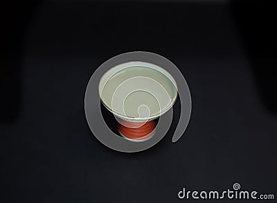 isolated sake cup or sakazuki on black background Stock Photo