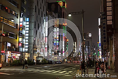 Tokyo, Japan, 04/08/2017: Street of a modern night metropolis with illumination Editorial Stock Photo