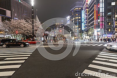 Tokyo, Japan, 04/08/2017: Street of a modern night metropolis with illumination Editorial Stock Photo