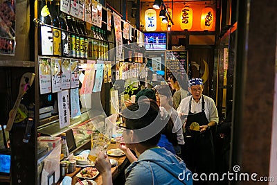 Tokyo restaurant at night in Omoide Yokocho Editorial Stock Photo