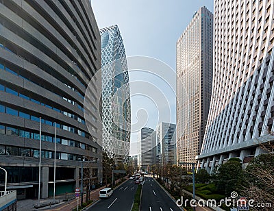 Tokyo skyscraper buildings and blue sky with street in Shinjuku, Tokyo, Japan Editorial Stock Photo