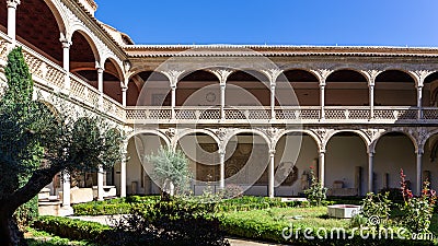 Courtyard and patio with garden of the Museum of Santa Cruz, Toledo, Spain. Editorial Stock Photo