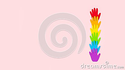 Tolerance, kindness, cooperative, friendship, charity humanitarian aid day concept. Many rainbow color palm hands on pink Stock Photo