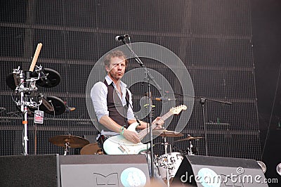 Tom Barman singing and playing live with the Deus band at Pohoda Festival, Trencin, Slovakia - July 8, 2011 Editorial Stock Photo