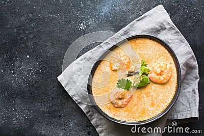 Tom yam kung spicy thai soup with shrimp, seafood, coconut milk and chili pepper. Asian cuisine. Stock Photo