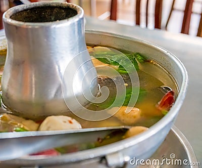 Tom Yum Soup seafood, Thai food cuisine hot pot traditional style. Stock Photo