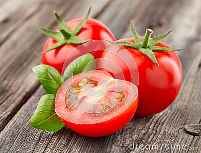 Tomato with basil Stock Photo