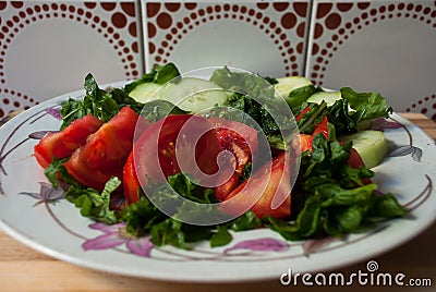 Tomato,cucumber and arugula salad Stock Photo