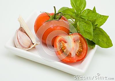 Tomato, garlic and basil Stock Photo