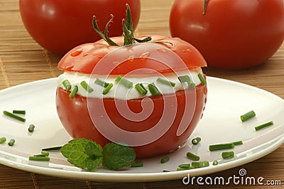 Tomato with lowfat cottage cheese and dill Stock Photo