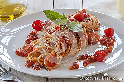 Tomato pasta with basil Stock Photo