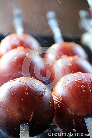 Tomato & Potato. Tasty, delicious, appetizing, healthy. Wood-fired grill vegetables. Barbecued vegetables. Cooked on skewer. Stock Photo