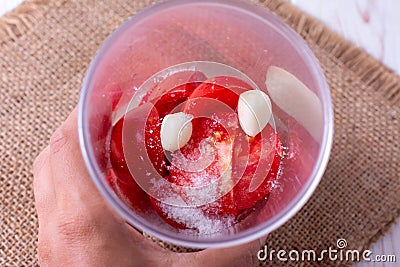 Tomato puree in a blender Stock Photo