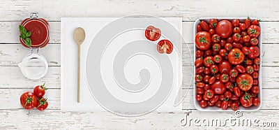 tomato sauce above, cutting board with spoon, glass jar and tomatoes isolated on white wooden kitchen worktop background, copy sp Stock Photo