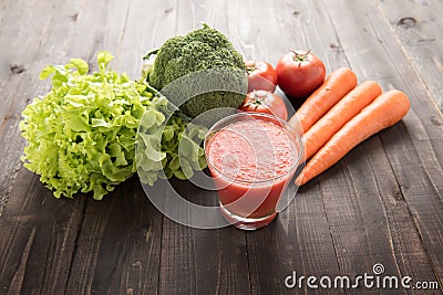 Tomato smoothie with fresh ingredients and vegetable. Stock Photo