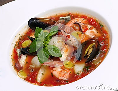 Tomato soup with seafood and fish Stock Photo