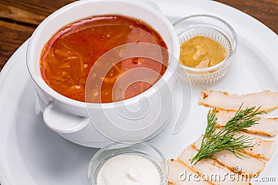 Tomato soup in a white bowl Stock Photo
