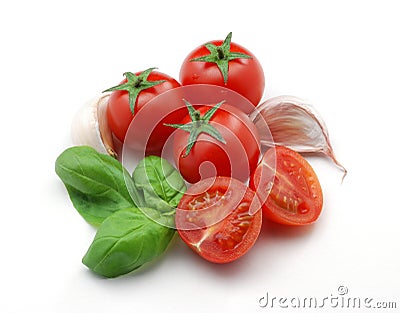 Tomatoes, basil and garlic Stock Photo