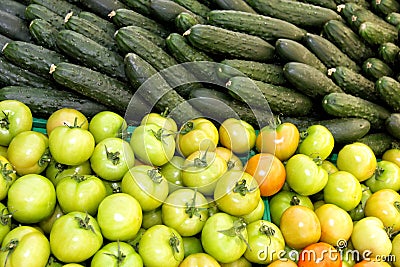 Tomatoes and cucumbers Stock Photo