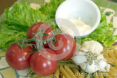 Tomatoes, Garlic and Pasta Stock Photo