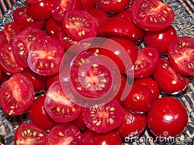 Tomatoes for homemade pizza. Cherry tomato from the English cherry is a variety with small fruits Stock Photo