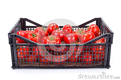 Tomatoes (Solanum lycopersicum) in plastic crate Stock Photo