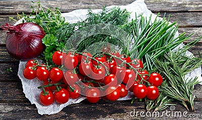 Tomatoes, Vegetables. Onion, Dill, Rosemary, Parsley, Chives and thyme. Stock Photo