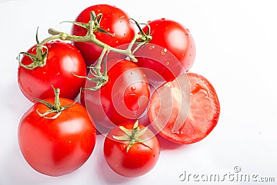 Tomatoes on a wooden table Stock Photo