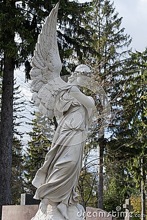 Tomb sculpture of a soaring angel Stock Photo