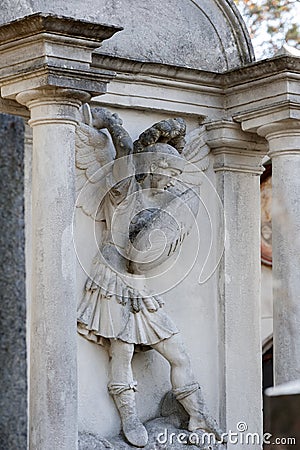 Tomb sculpture of a warrior on a wall of ancient crypt Stock Photo