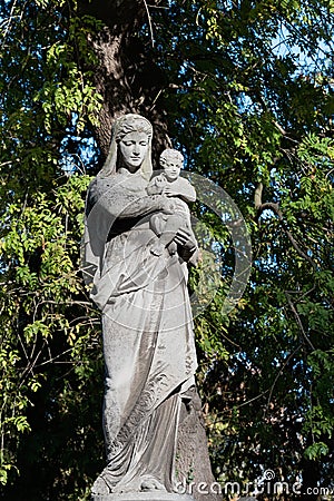 Tomb sculpture of a woman with a child Stock Photo