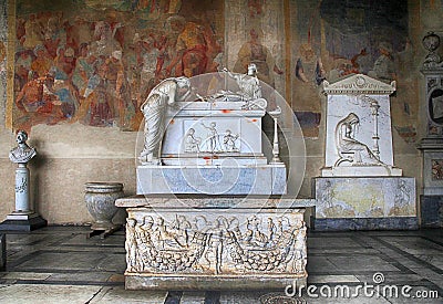 Tomb sculptures on marble tomb in medieval Camposanto Cemetery, Editorial Stock Photo