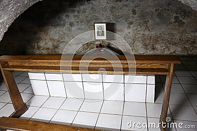 The tomb of the Servant of God Peter Barbaric in the Church of St. Aloysius in in Travnik Editorial Stock Photo