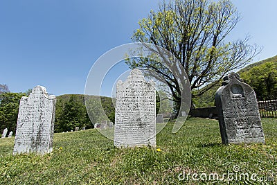 Tomb stone in grave yard Stock Photo