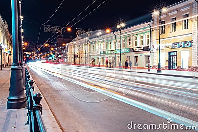 TOMSK, RUSSIA - September 25, 2019: Panorama night city scape in light of lanterns with moving cars Editorial Stock Photo